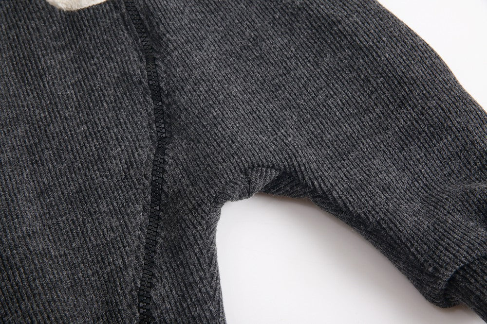 Close-up of dark gray ribbed knit fabric