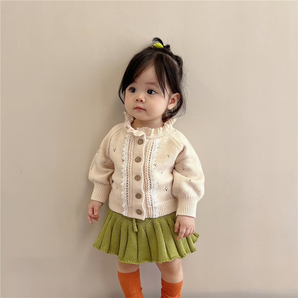 Front view of toddler wearing cream lace collar knit cardigan jacket