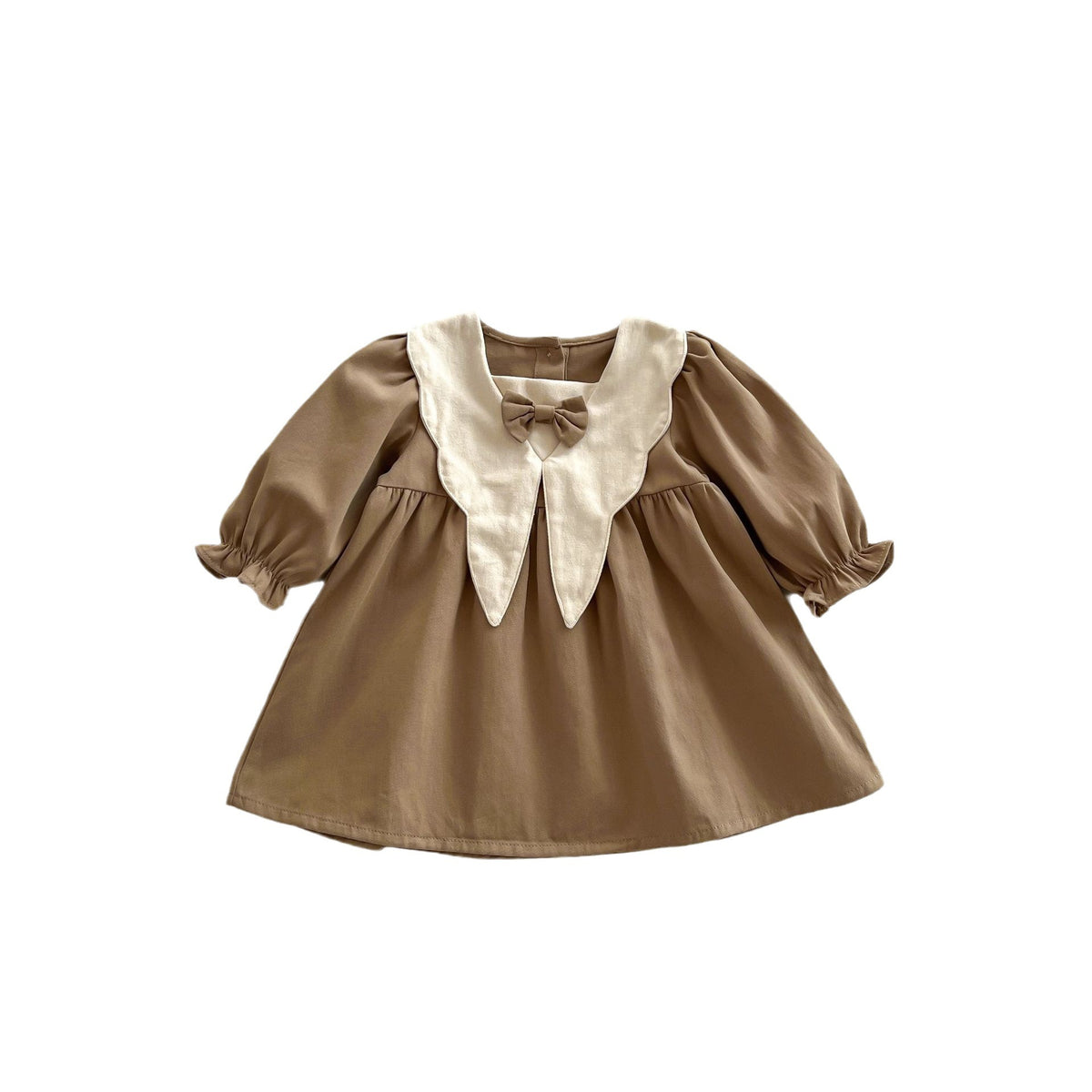 Light brown corduroy dress on white background