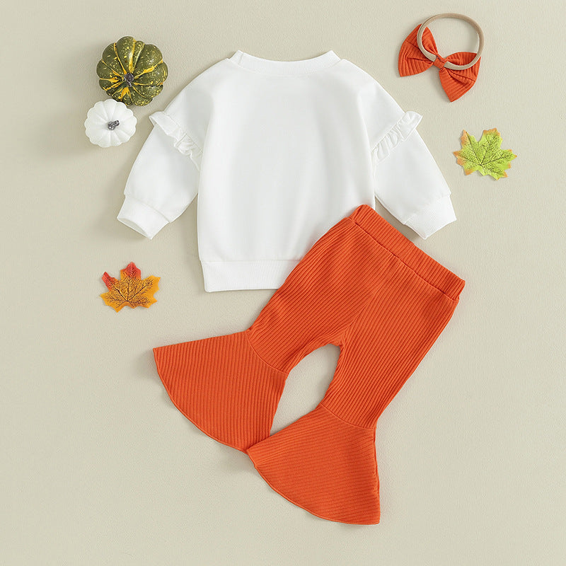 Little Pumpkin outfit with autumn leaves