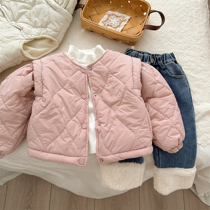 Pink quilted fleece-lined jacket styled with jeans