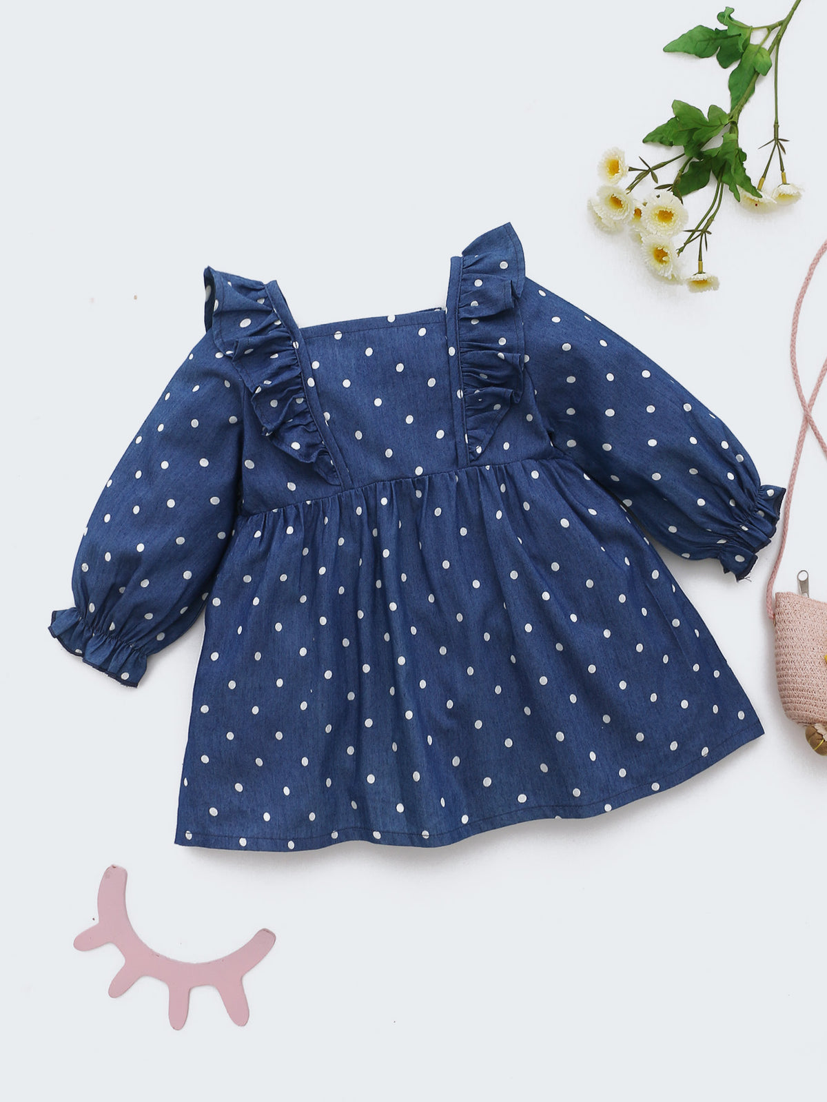 Navy polka dot princess dress with flowers