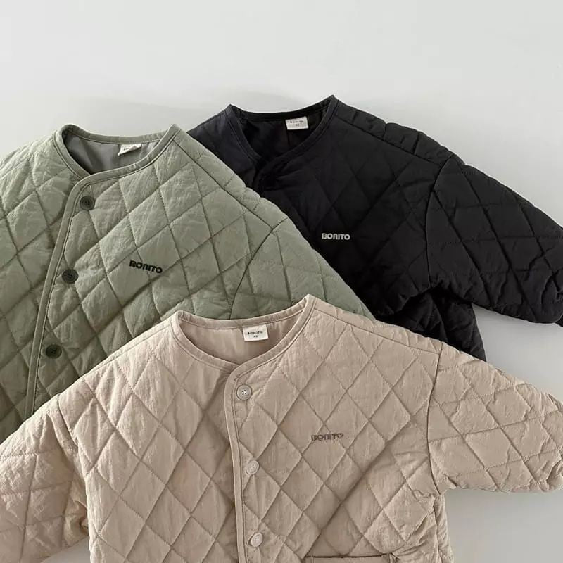 Green, black and apricot quilted jackets stacked
