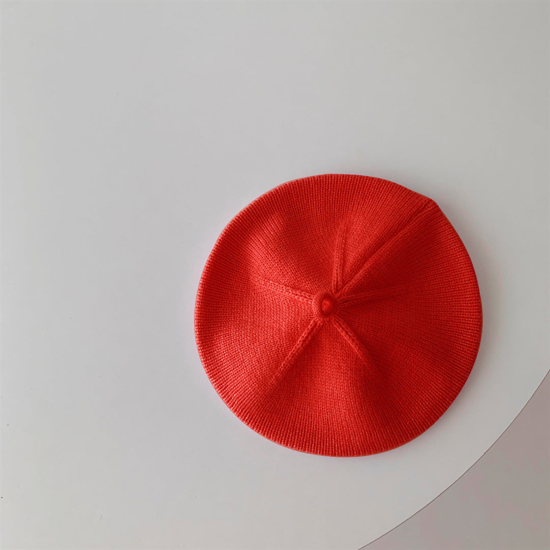 Red knitted baby beret