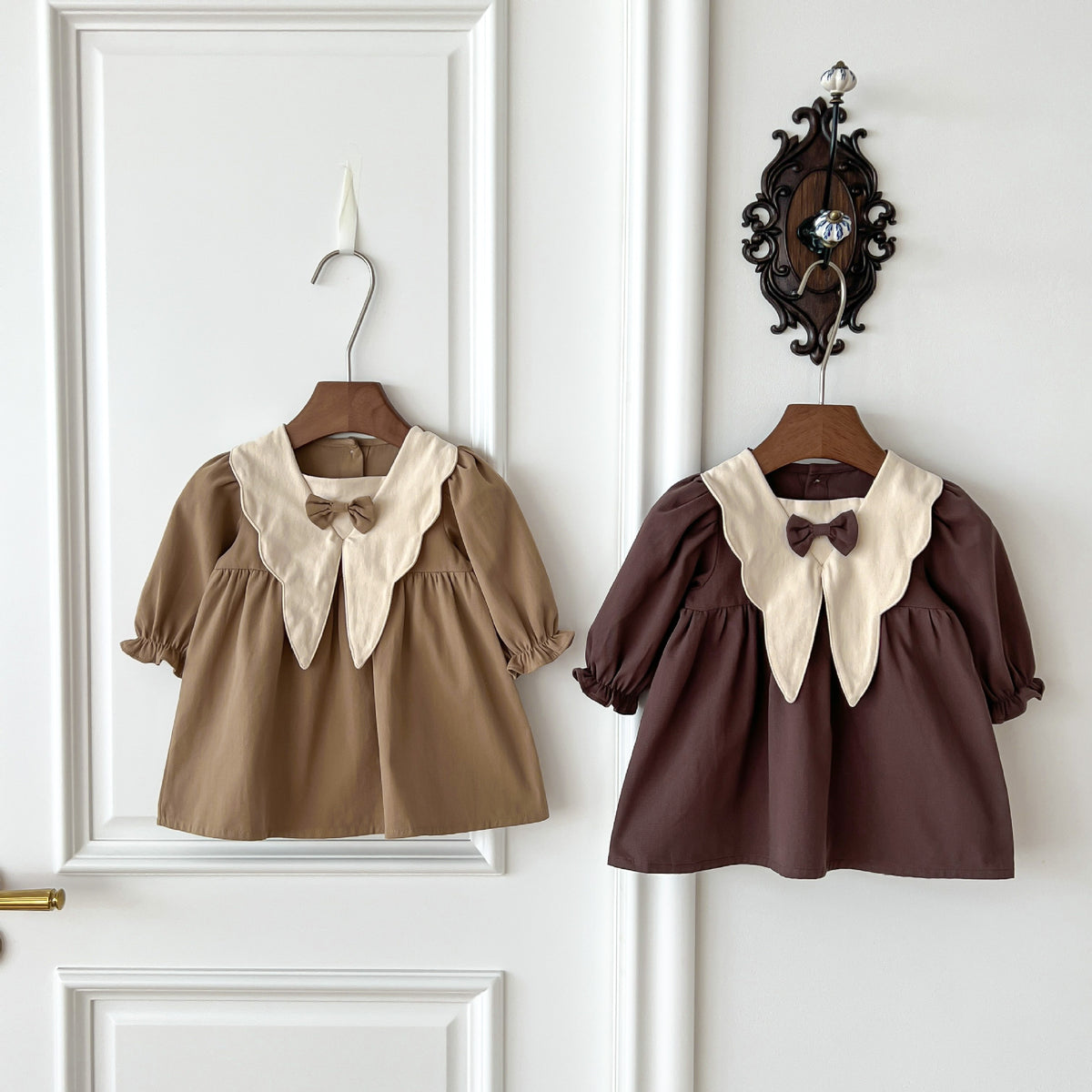 Light brown and brown corduroy dresses with cream collars