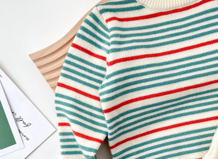 Close-up of striped knit pattern on baby sweater