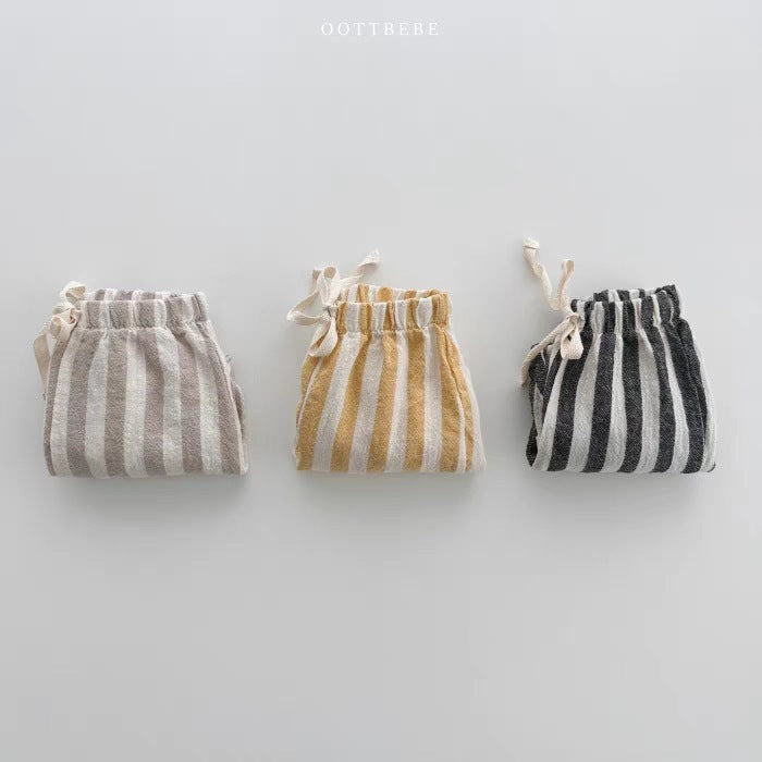 Three folded vertical striped pants