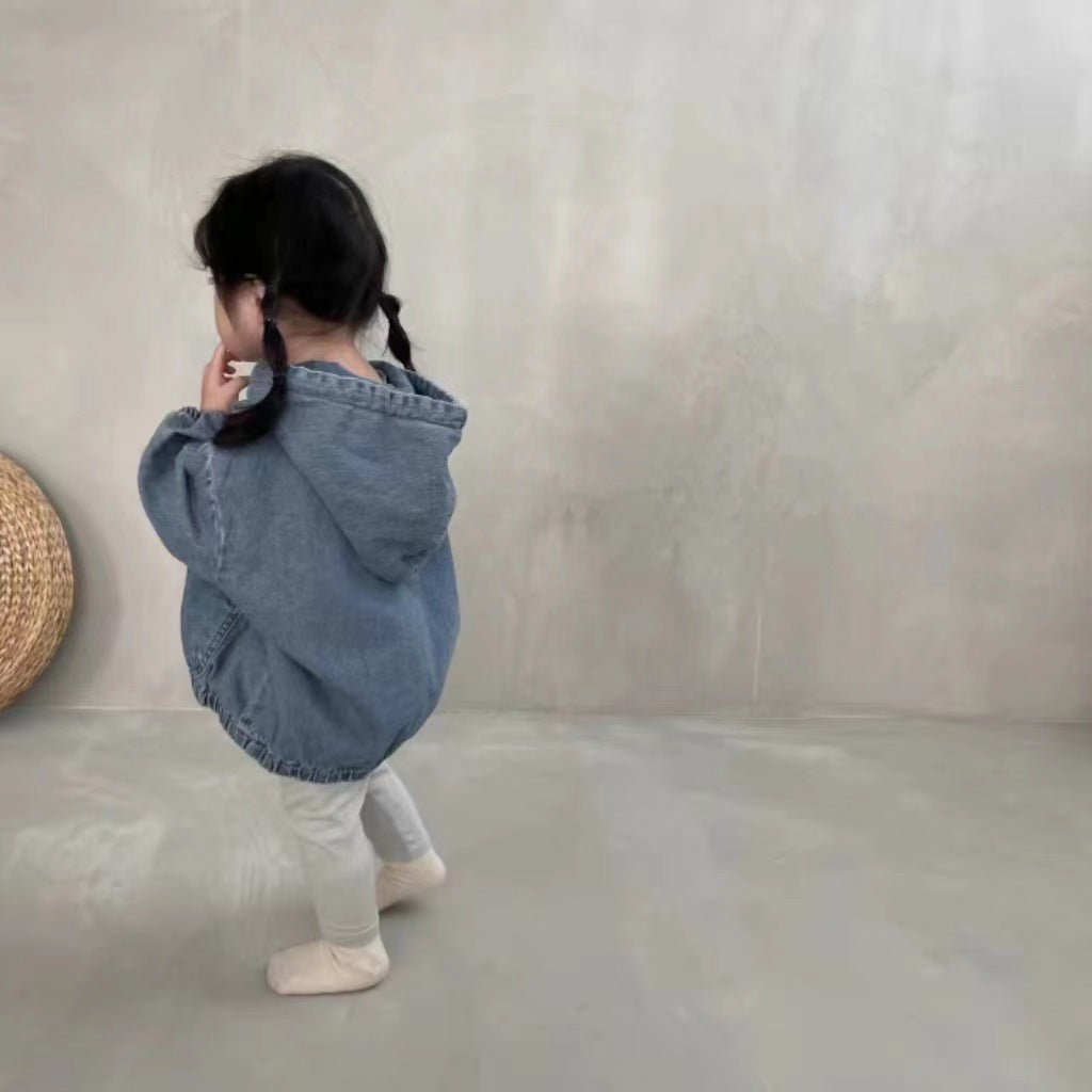 Toddler wearing denim hoodie, back view