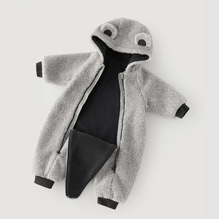 Grey fleece romper unzipped to show the two-way zip and soft inner lining