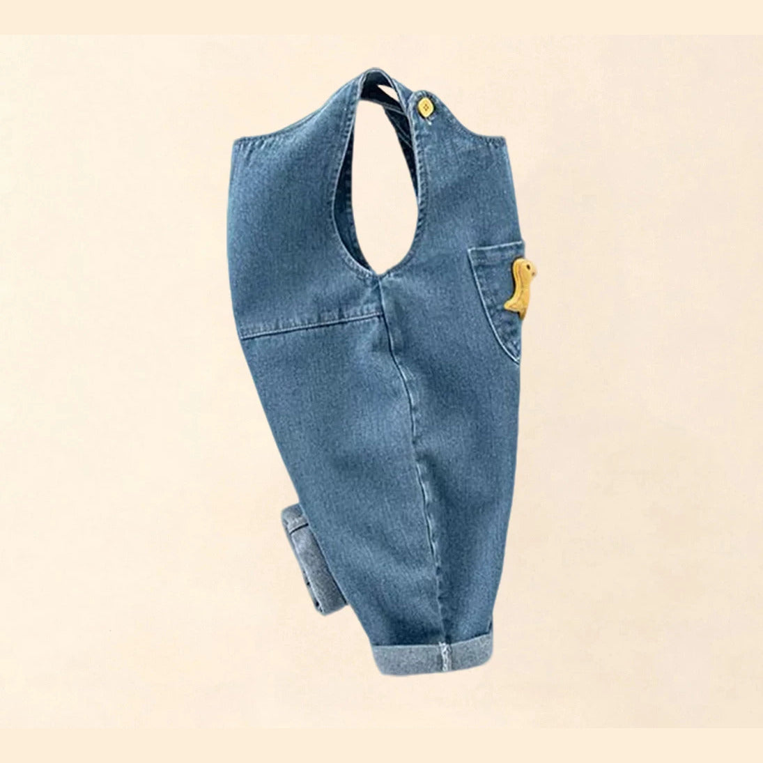 Side profile of relaxed-fit baby denim overalls