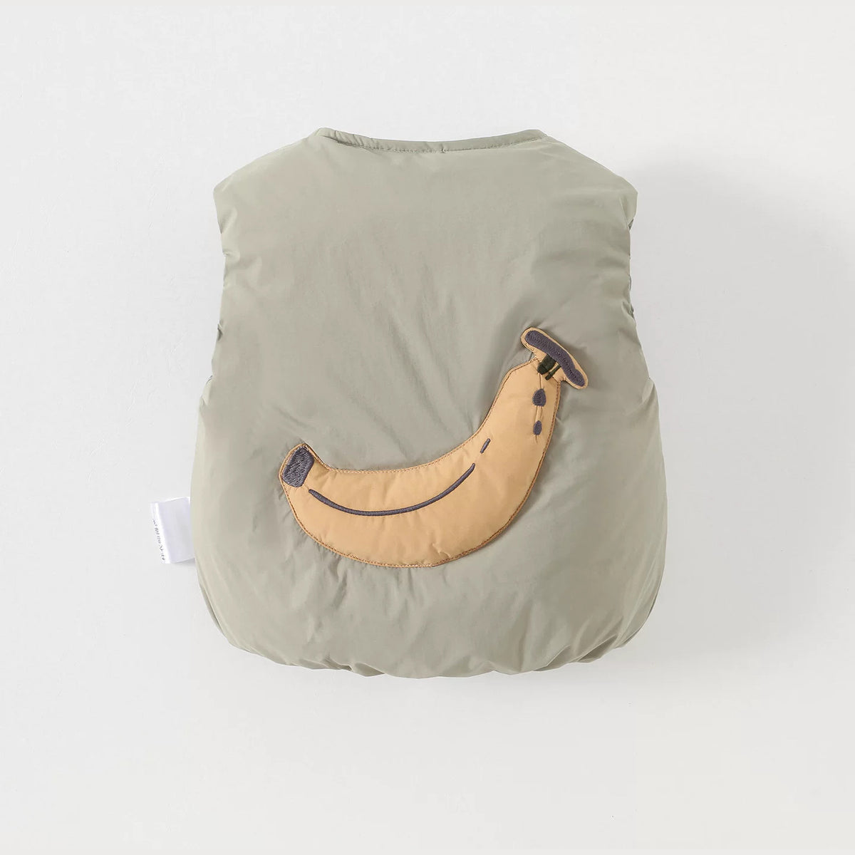 Sage baby down vest with a puffy banana appliqué on the back