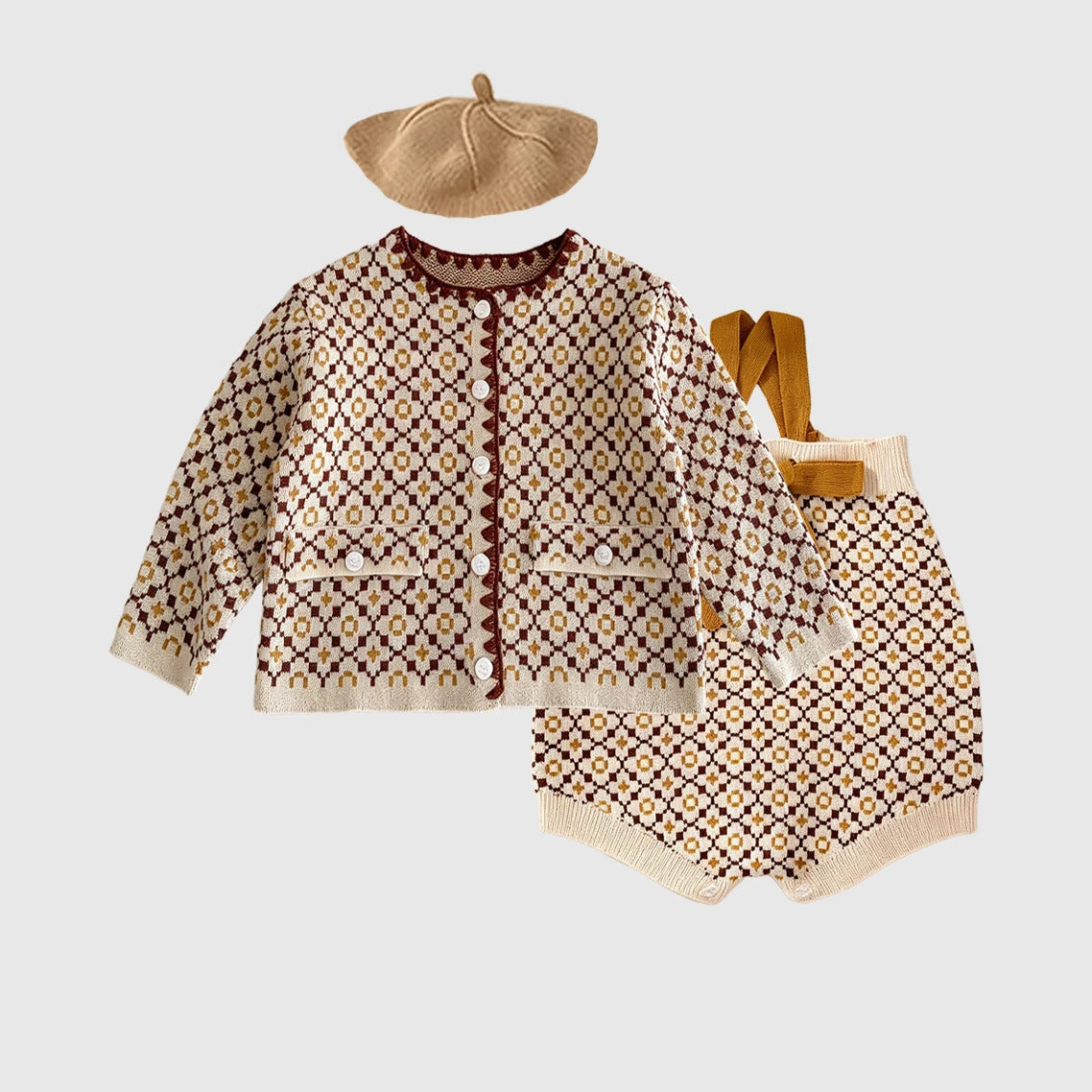 Knit cardigan and romper set with camel beret, flat lay