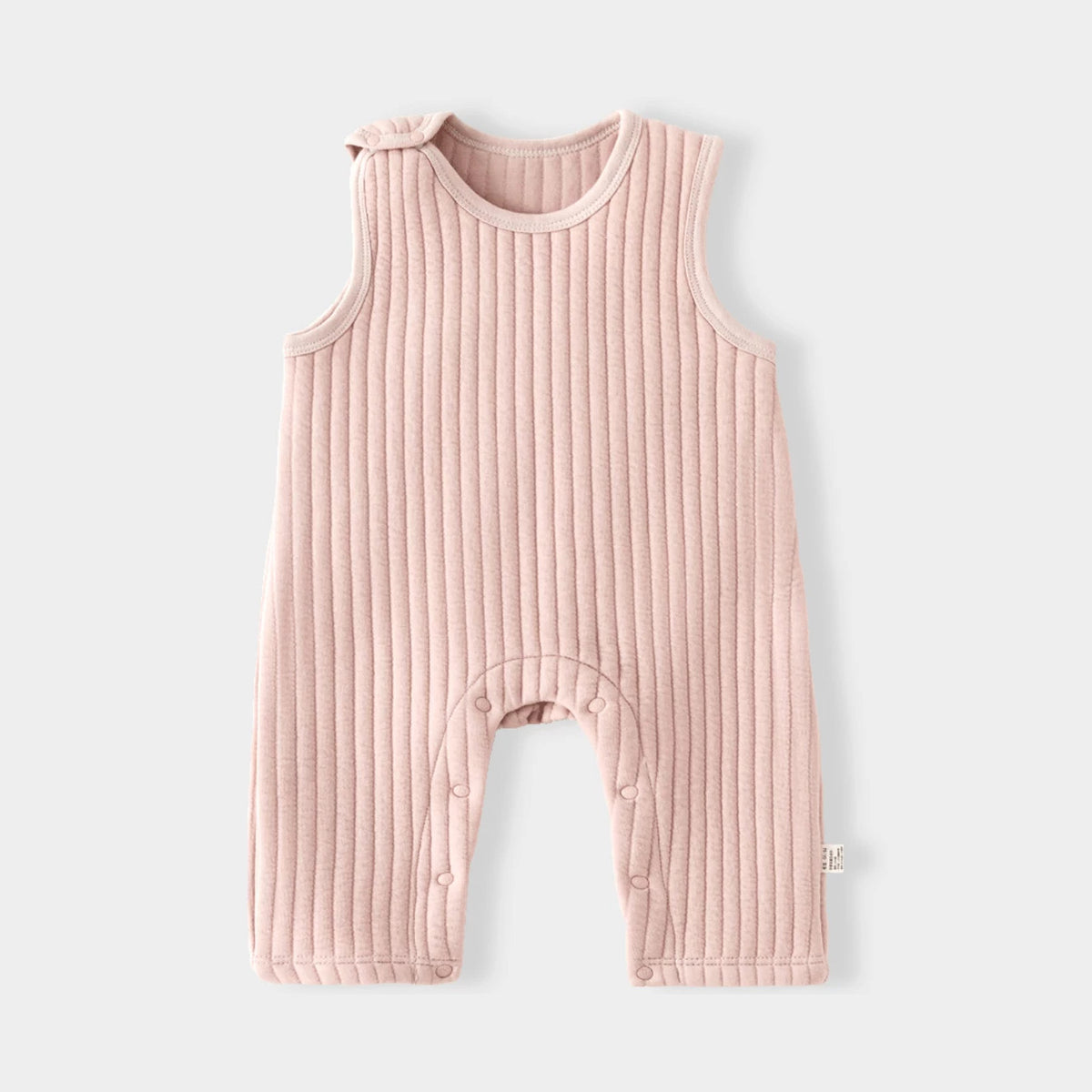 Blush pink quilted padded baby romper, flat lay