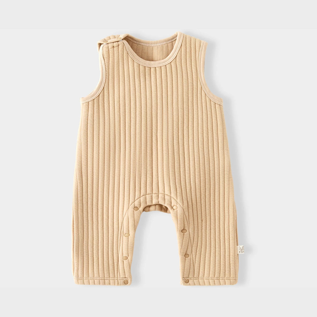 Camel quilted sleeveless baby romper with shoulder snap, flat lay