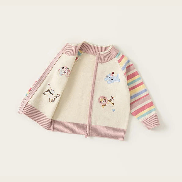 Rainbow cardigan laid open to show the smooth inside
