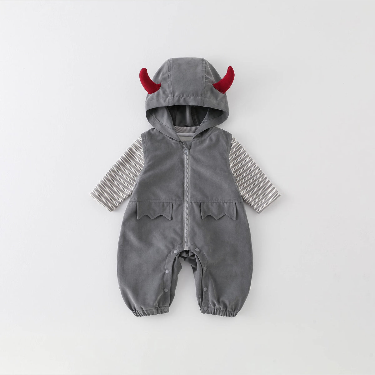 Little devil hooded romper worn over a striped tee, front flat lay