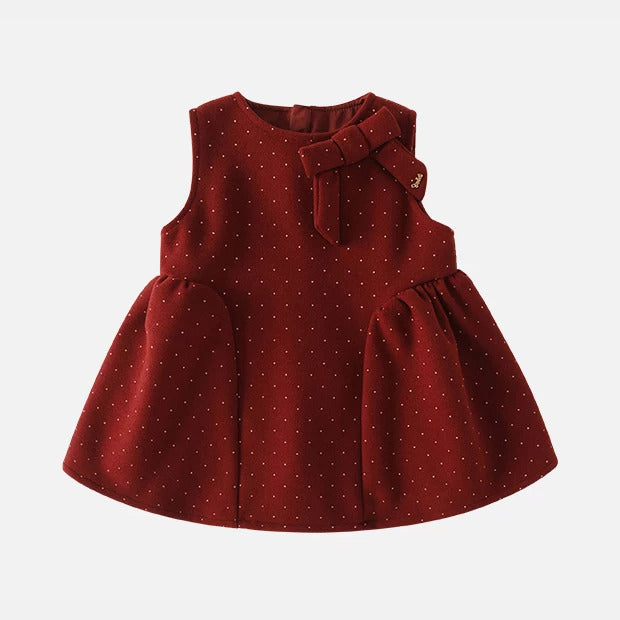 Red dotted sleeveless pinafore dress with bow, front view