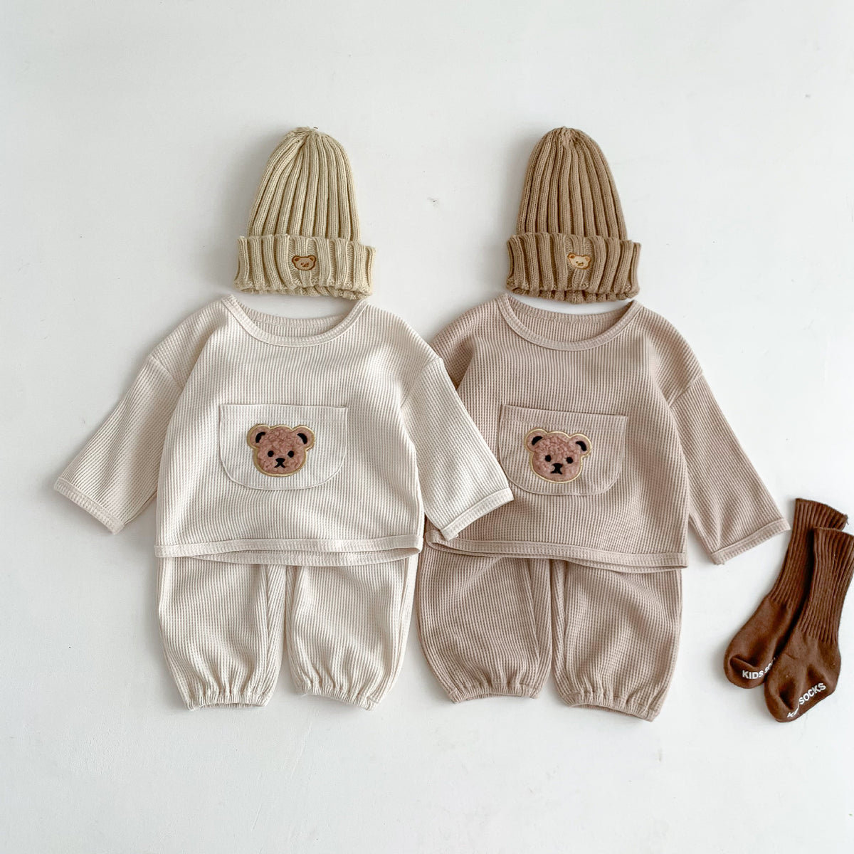 Cream and taupe waffle sweatshirt and jogger sets with teddy bear pockets and beanies