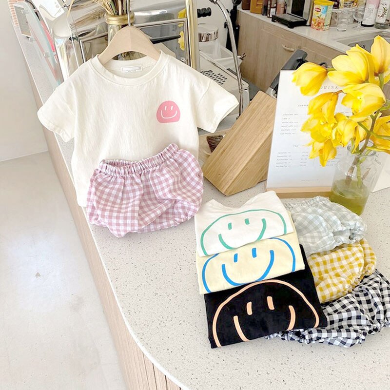 Smiley Face T-shirt and Plaid Shorts