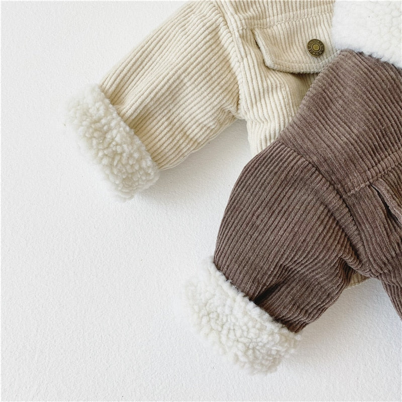 Sherpa cuff and corduroy texture close-up