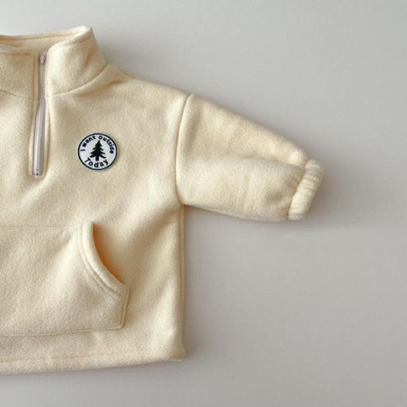 Beige polar fleece pullover with front pocket and badge patch