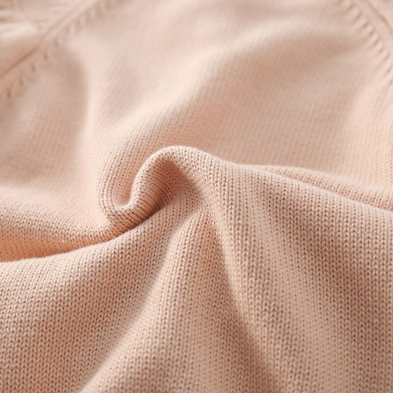Close-up of soft pink knit fabric