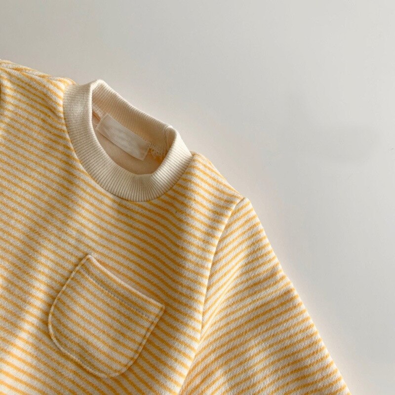 Chest pocket detail on yellow stripe baby romper
