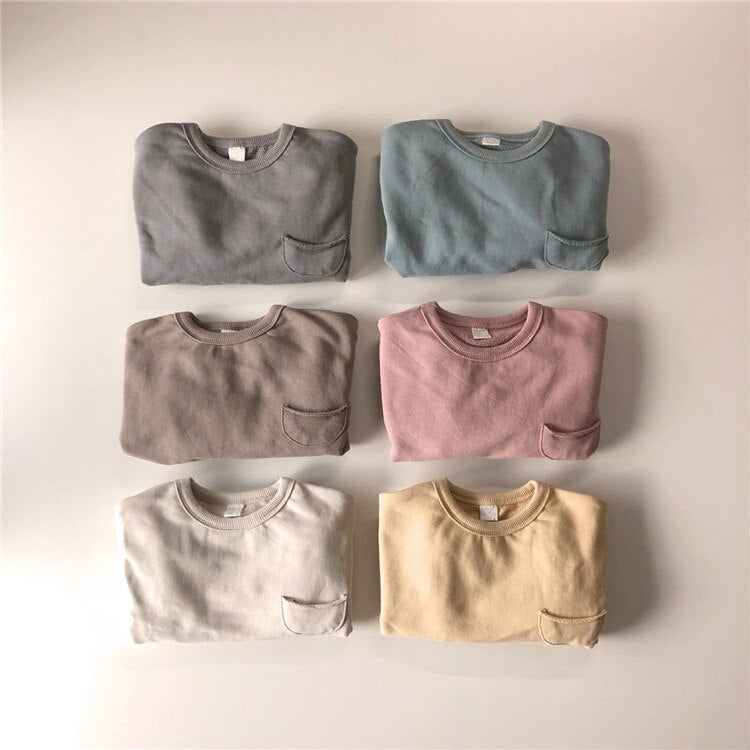 Basic sweatshirt sets in six colours laid flat