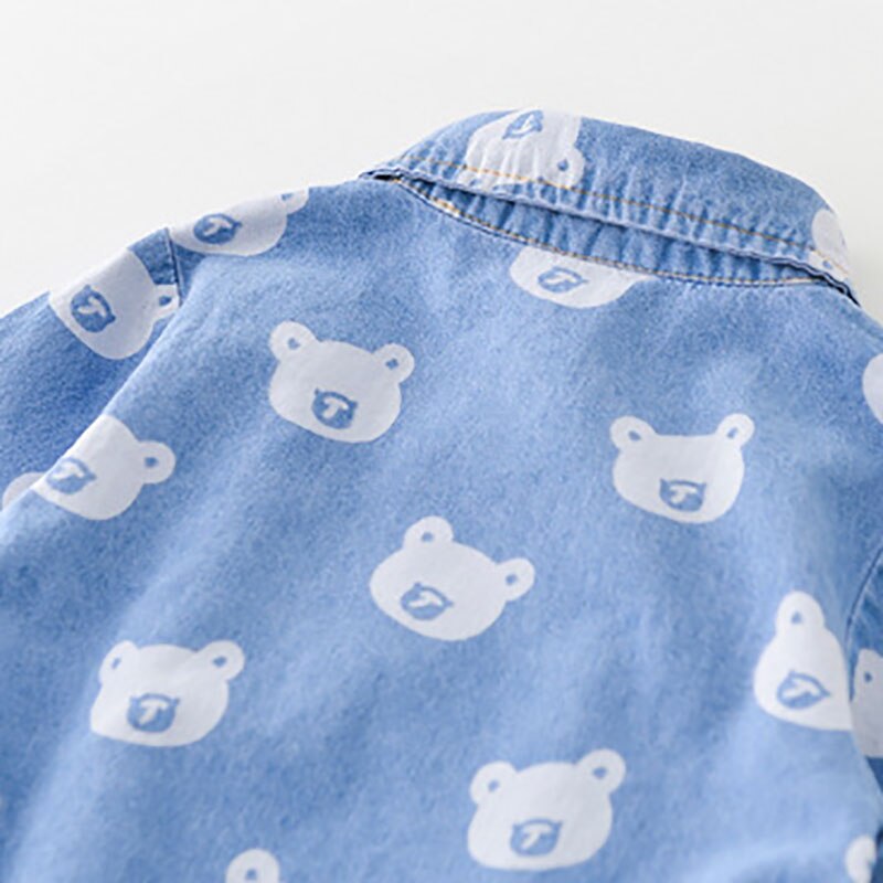 Close-up of bear print on denim