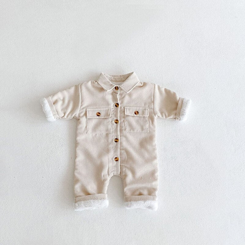 Beige corduroy jumpsuit on white background