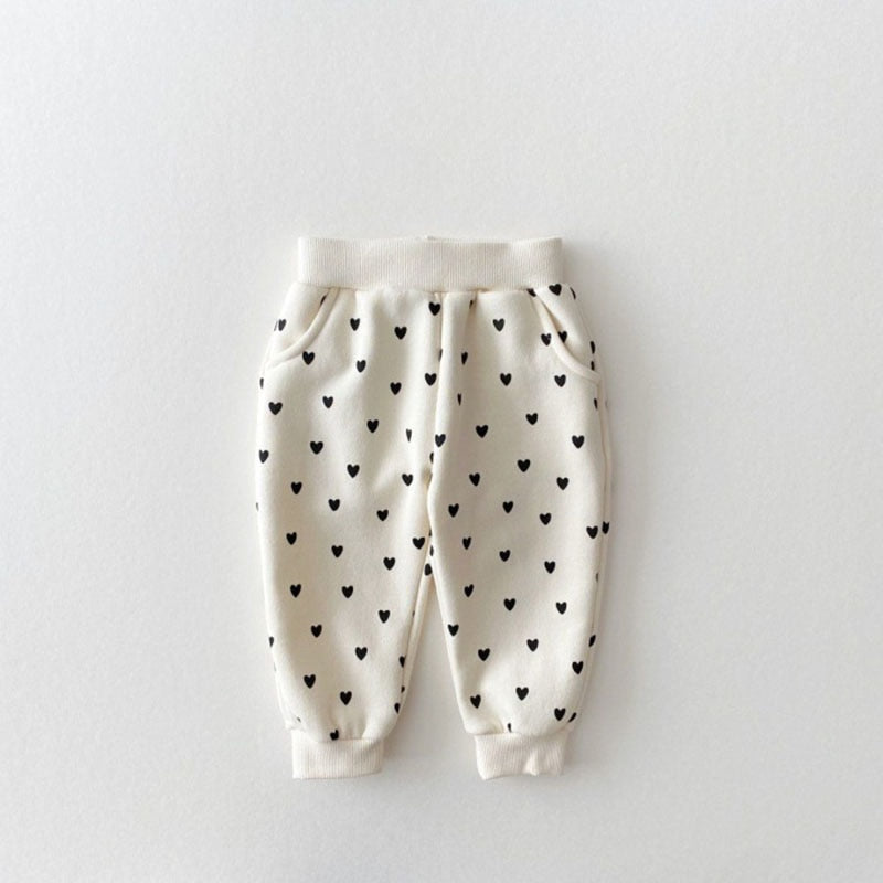 Beige heart print fleece pants