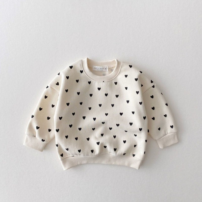 Beige heart print fleece sweatshirt