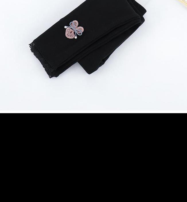 Black cotton leggings with brooch