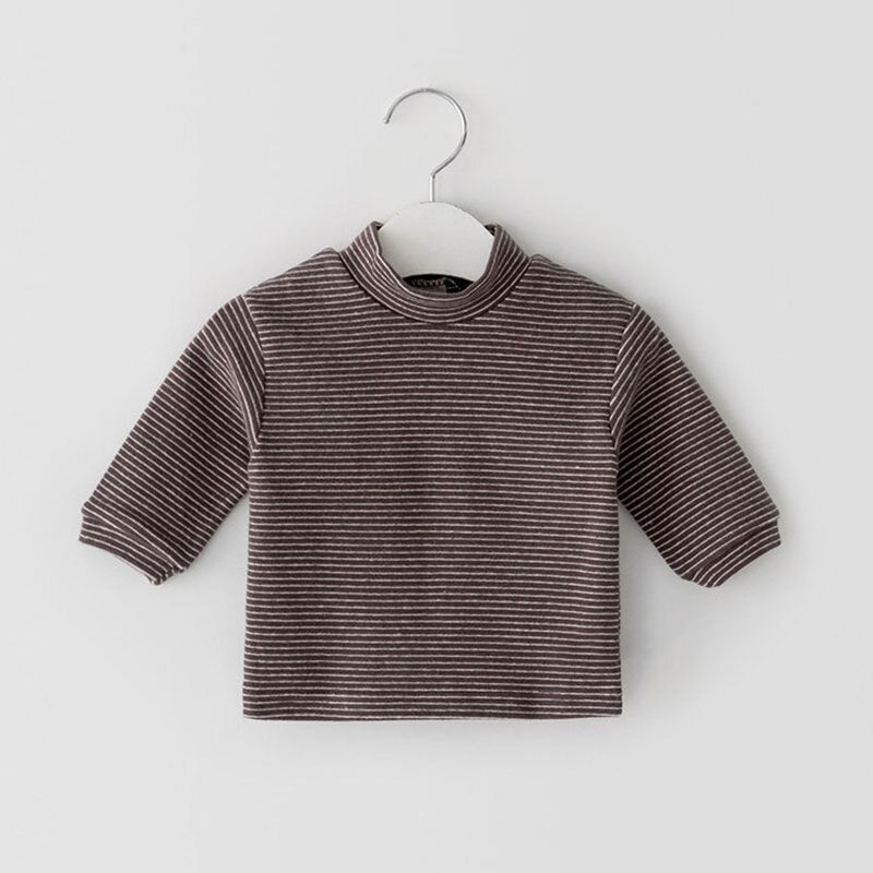 Coffee striped mock neck top on a hanger