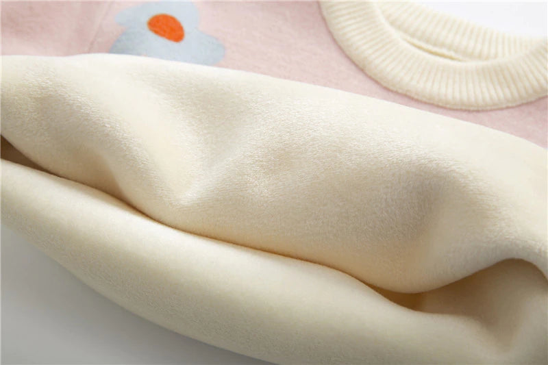 Close-up of plush lining inside daisy sweater