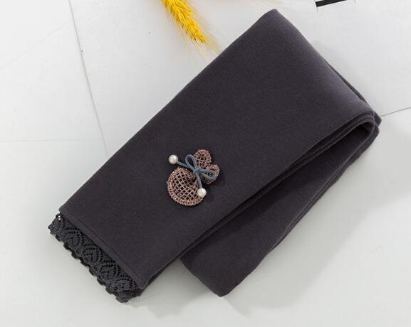 Dark gray cotton leggings with brooch
