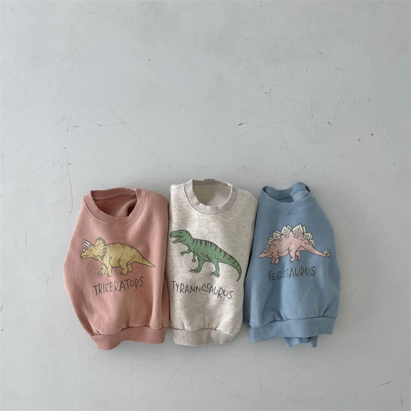 Stacked dinosaur fleece pullovers