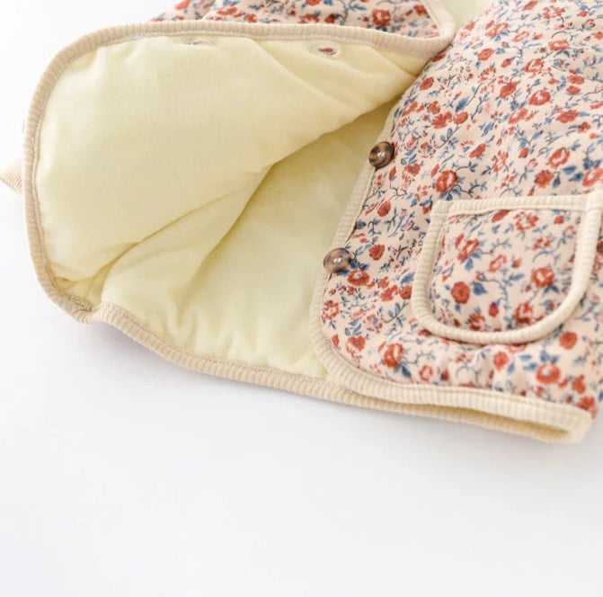 Floral quilted jacket showing plush lining