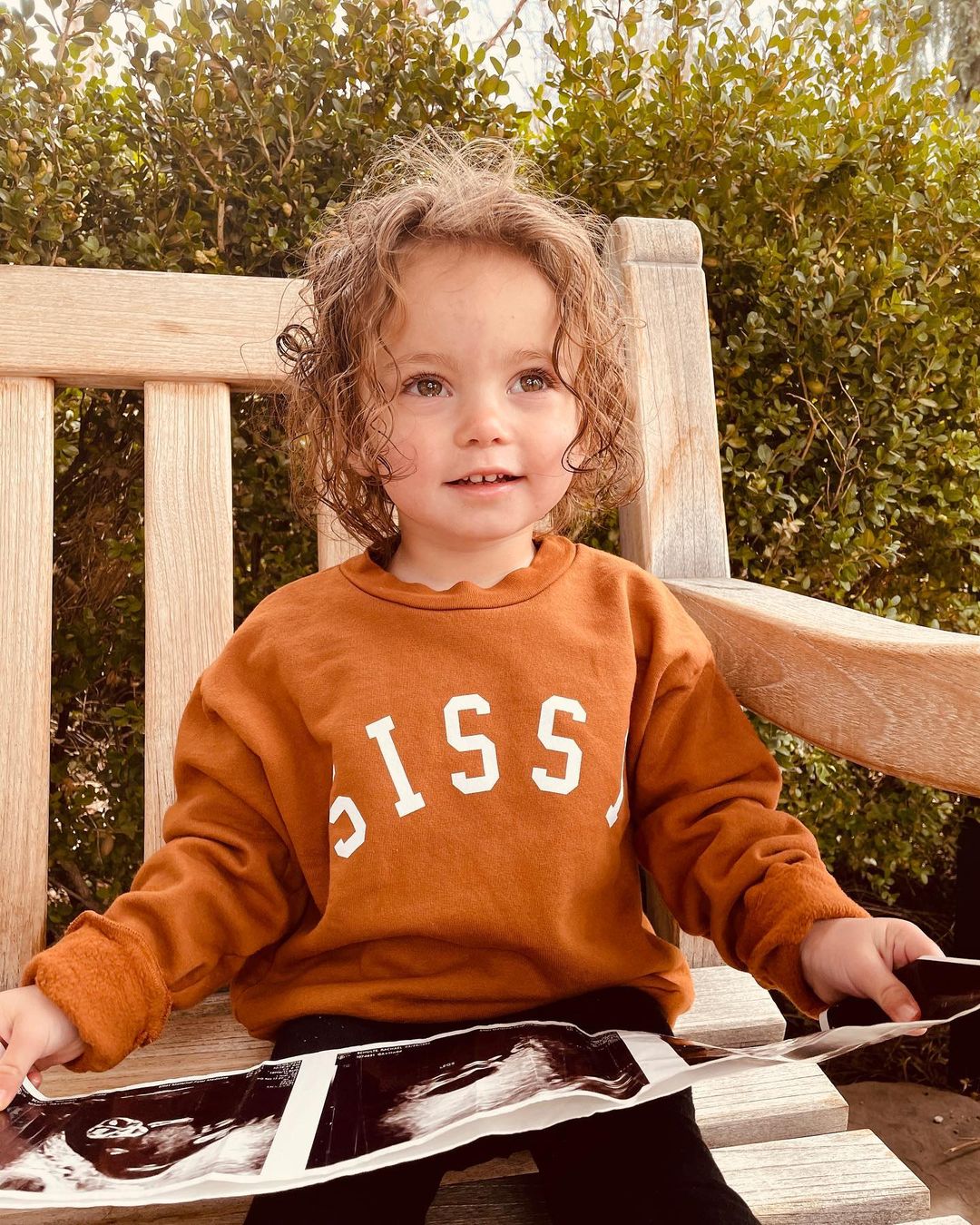 Girl wearing auburn SISSY sweatshirt