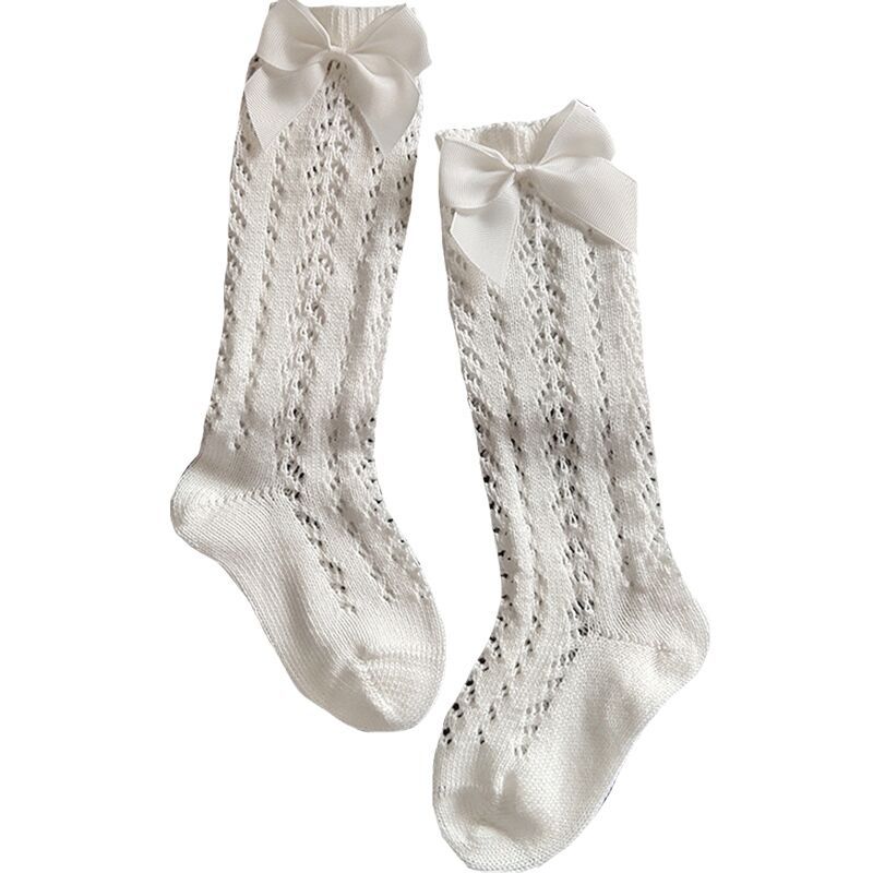 Gray openwork bow socks on white background