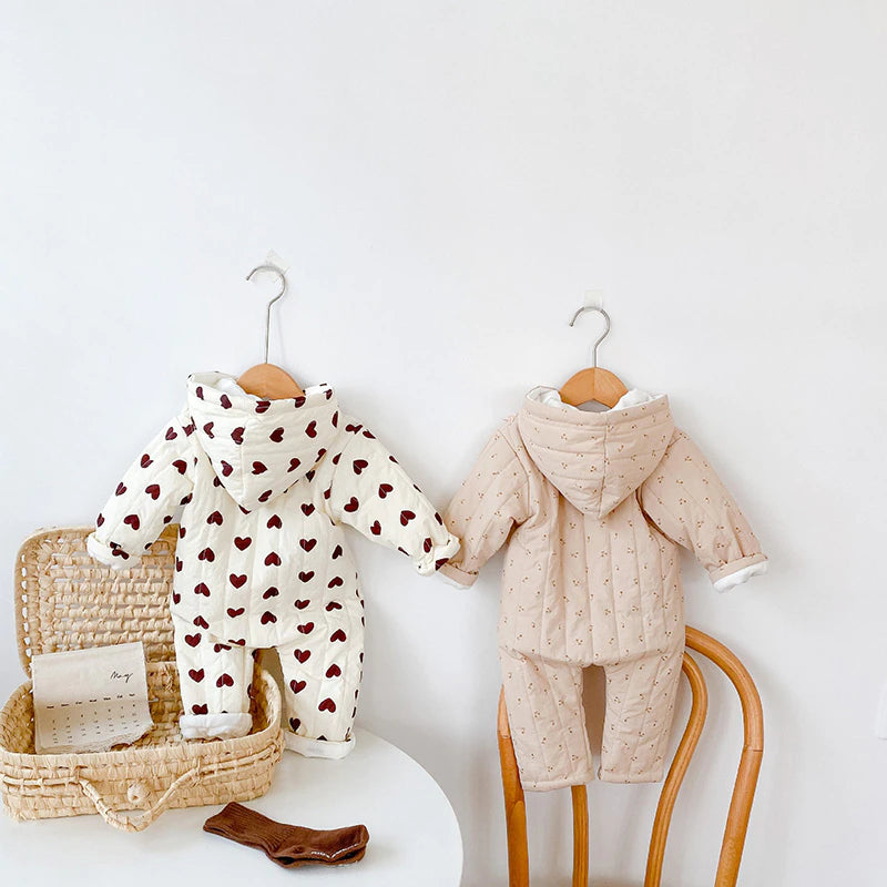 Heart and cherry rompers on hangers with basket