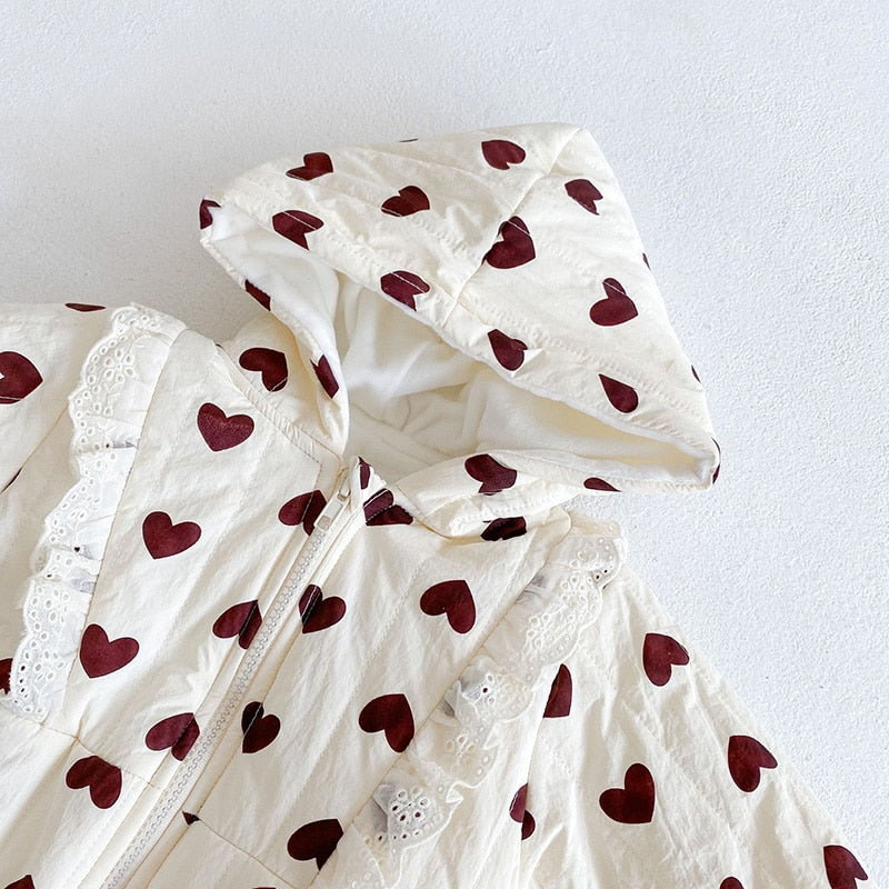 Close-up of heart print quilted hood