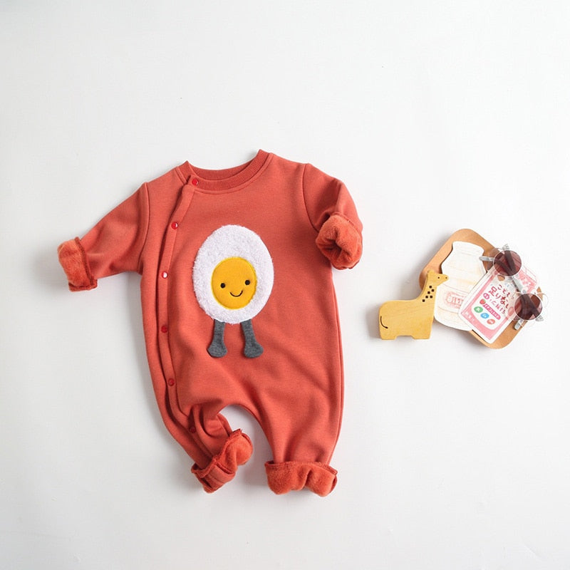 Orange fleece-lined jumpsuit with egg applique