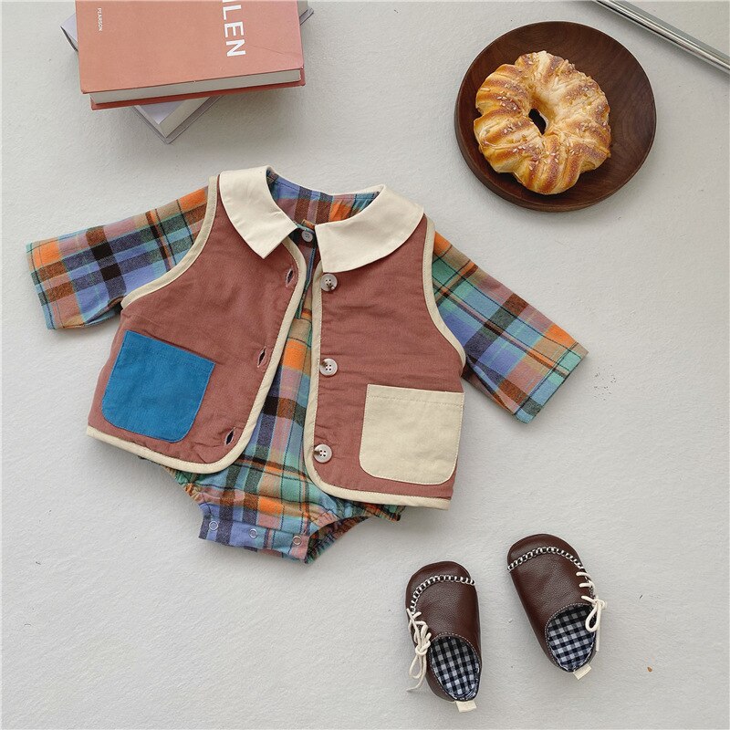 Orange plaid romper with brown fleece vest