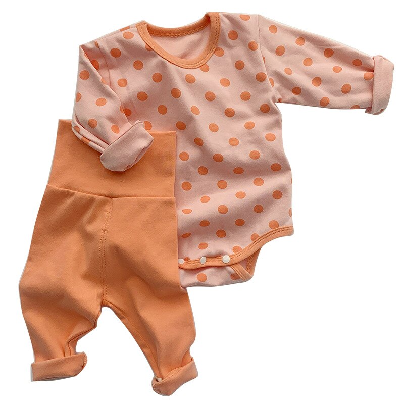 Orange polka dot bodysuit with high-waist leggings