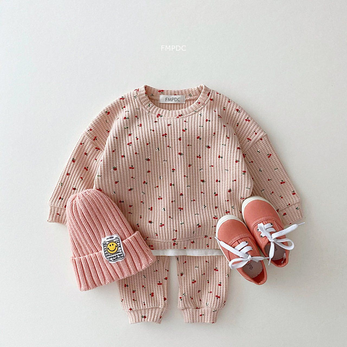 Pink cherry print top and trousers with beanie