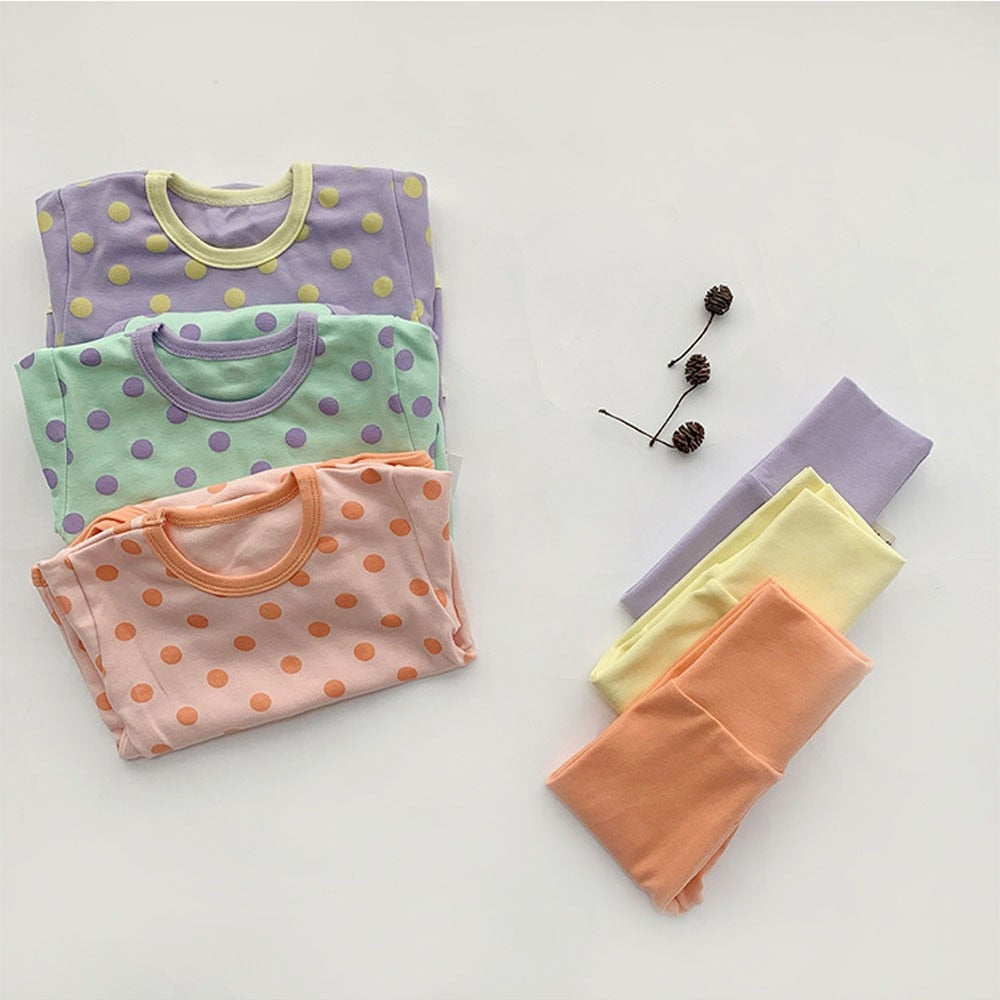 Polka dot bodysuits with high-waist leggings in three colours