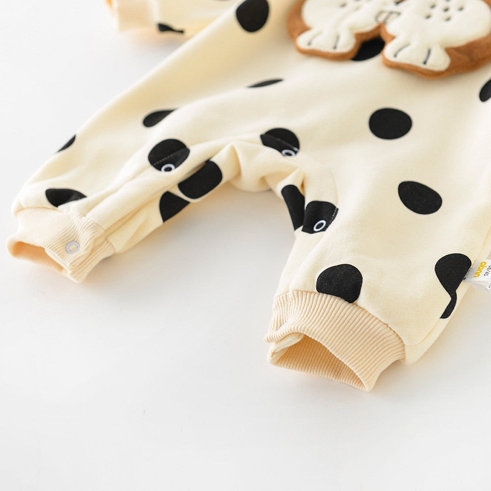 Close-up of polka dot romper leg