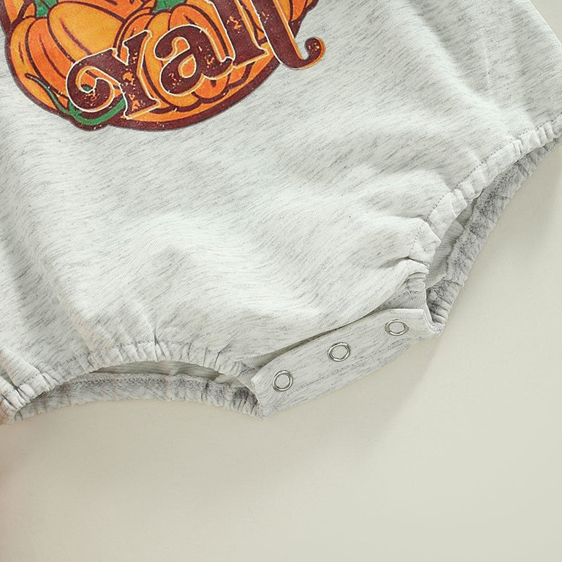 Close-up of snap crotch on gray romper