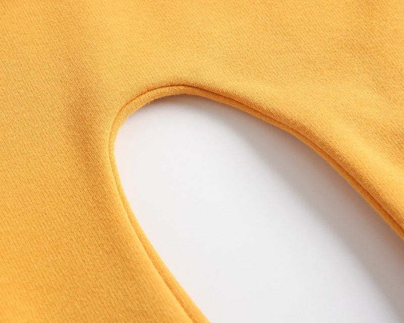 Close-up of neckline on yellow jumpsuit